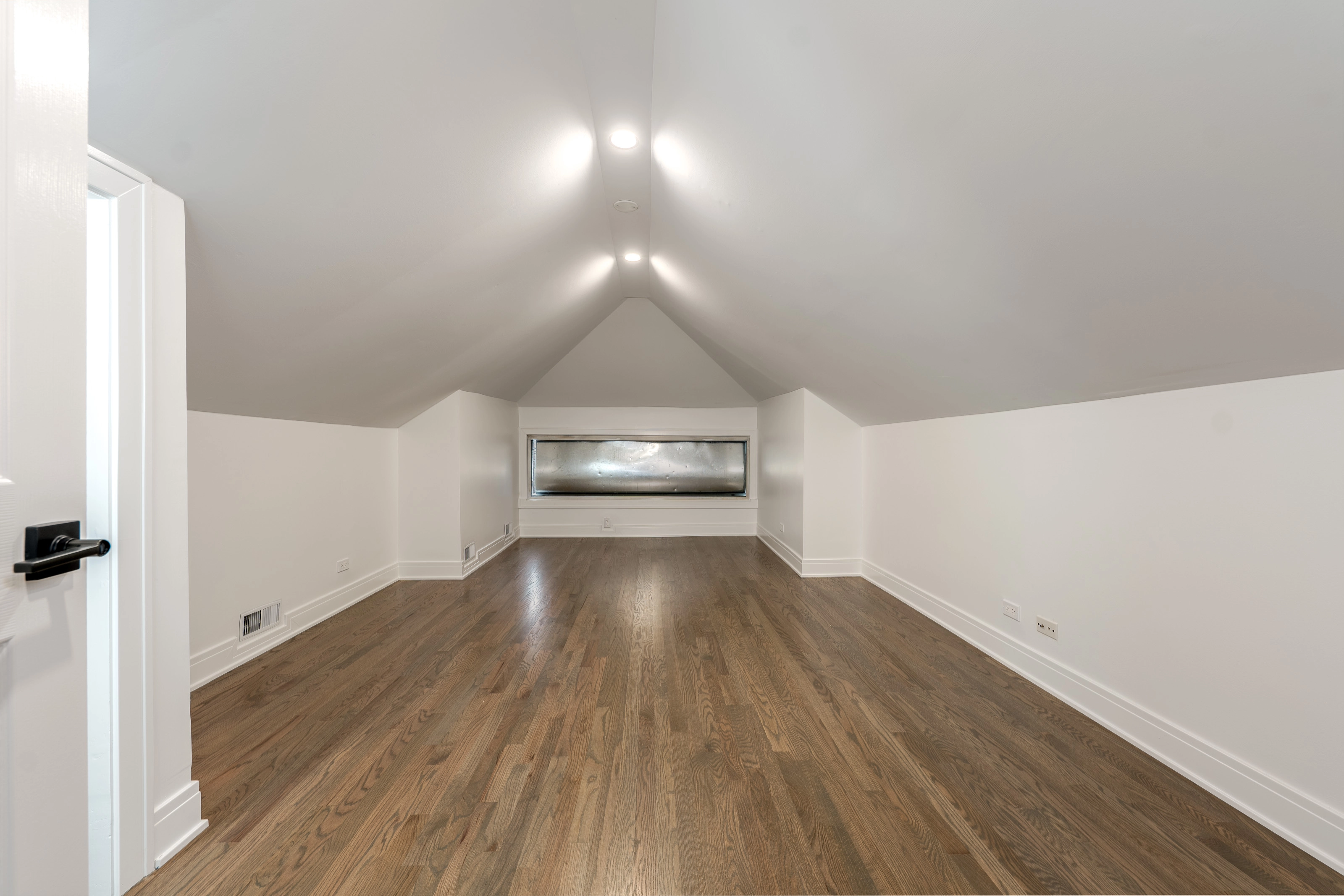 Finished attic with two recessed lights
