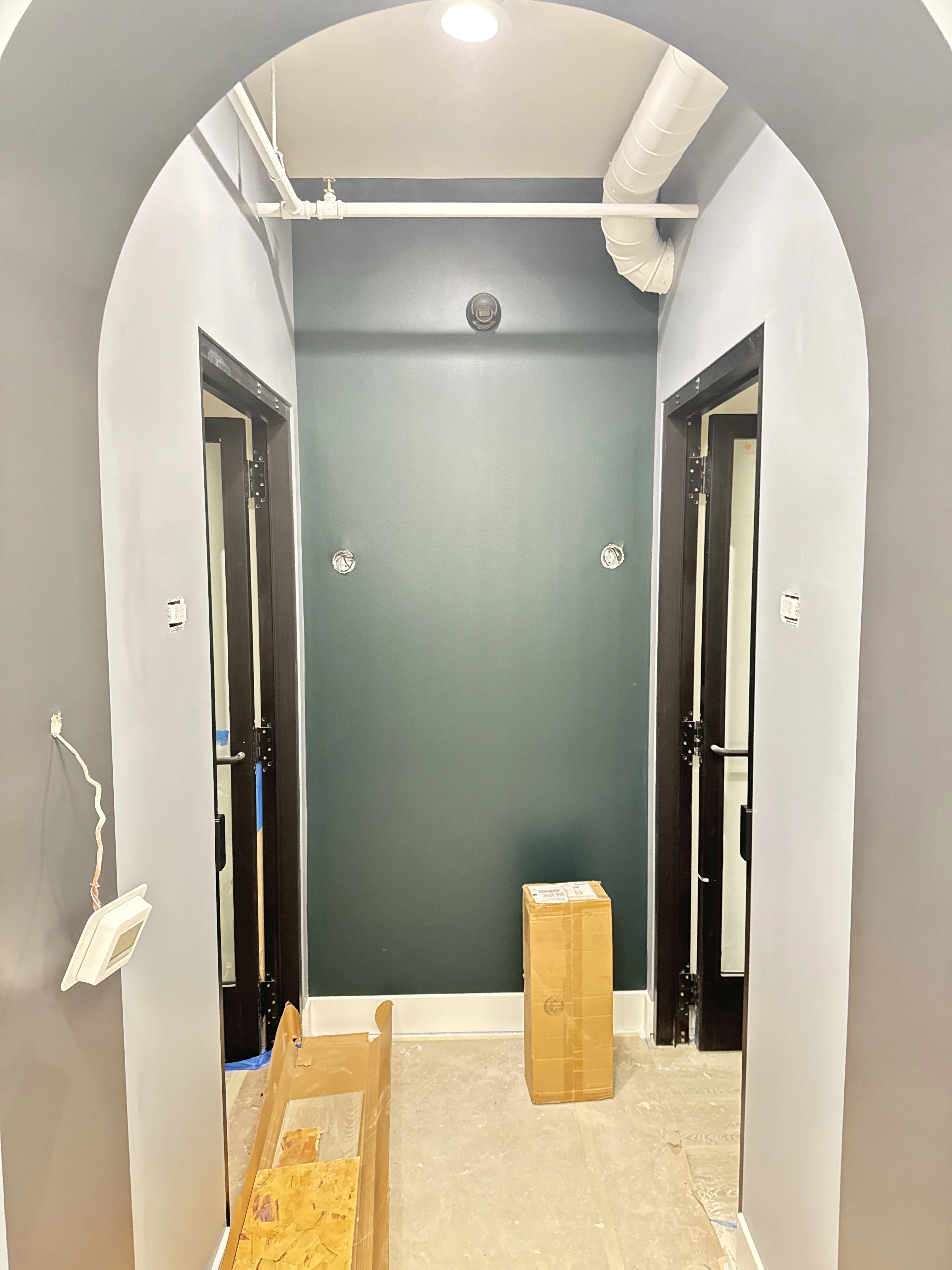 Hallway with recessed light and thermometer wiring