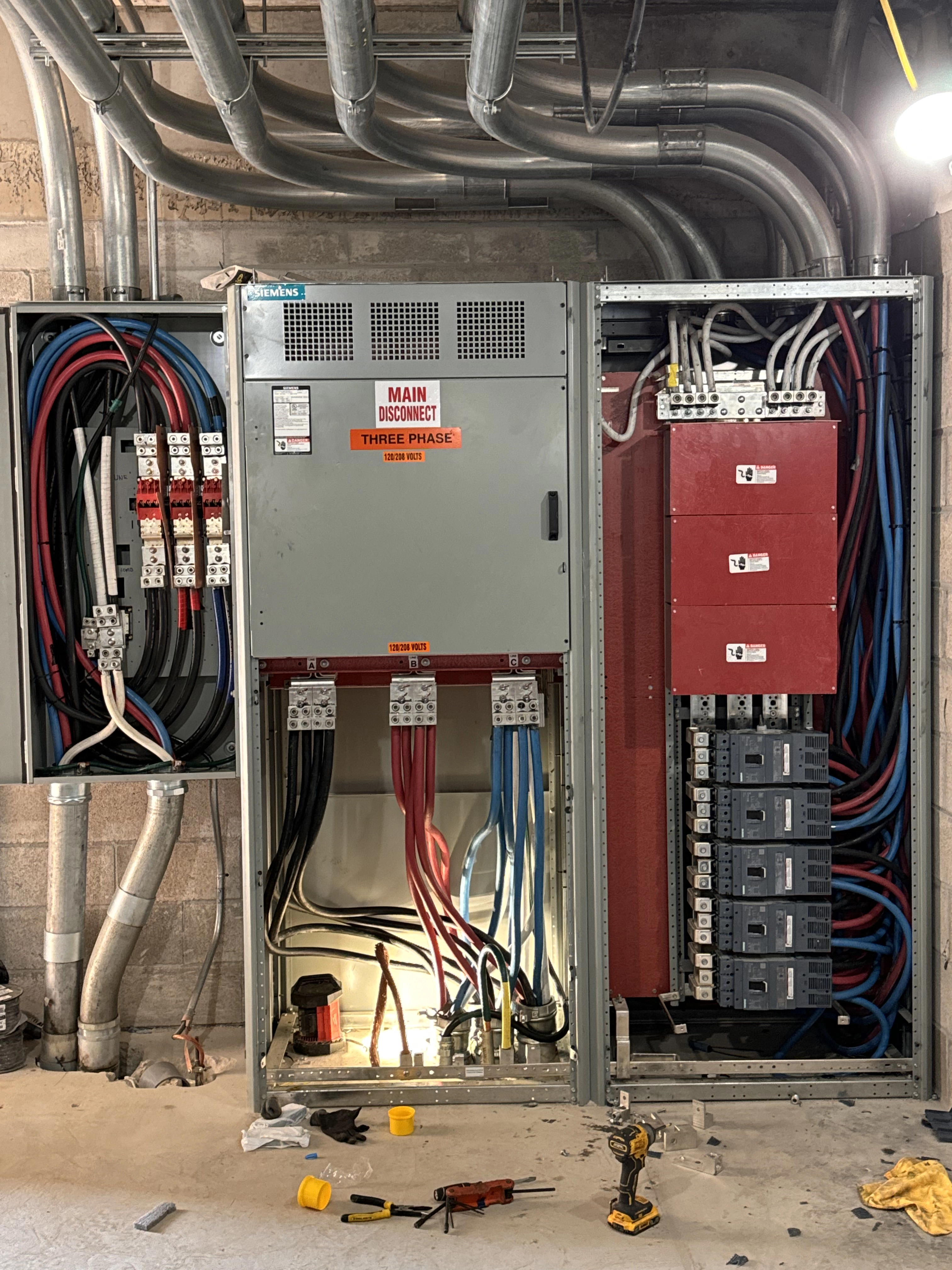 Previous labeled box and two more boxes on either side, completed with white, black, red, and blue organized wires
